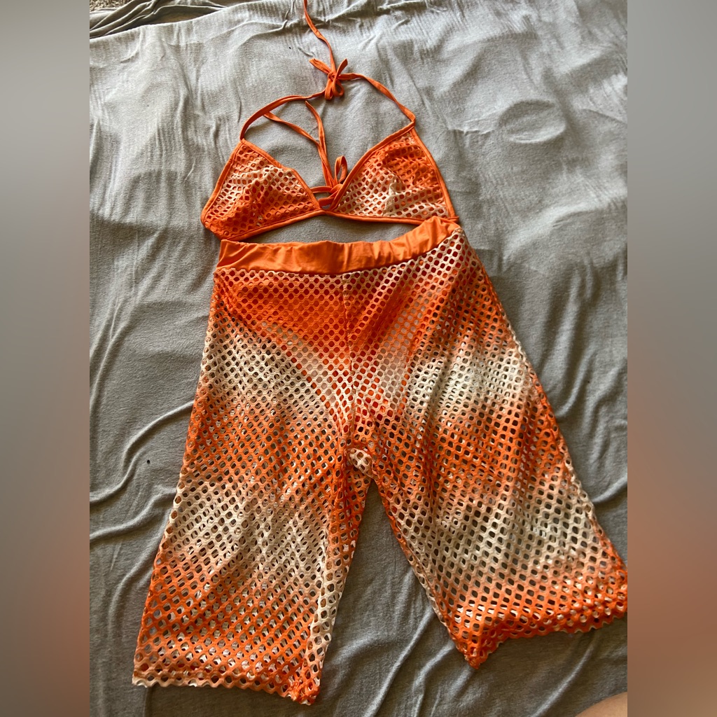 Orange And White Mesh Swim Top And Pants That Come With Built In Swim Bottoms